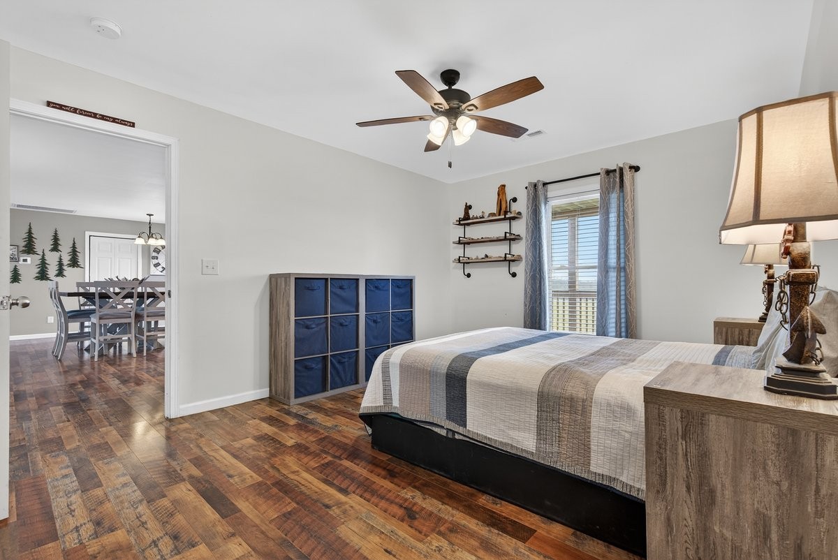 15419 Old Palestine Road Crofton, KY 42217 - Photo 36 of 53 a bedroom with a bed and a table