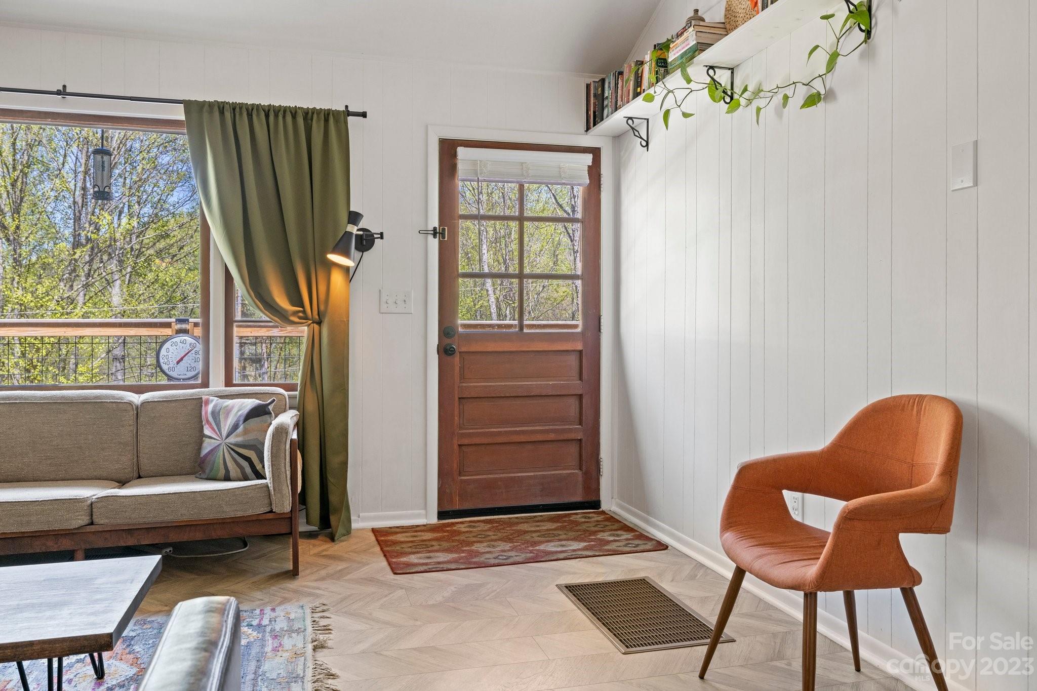 316 Rules Run Road Clyde, NC 28721 - Photo 13 of 47 a bedroom with a bed and a window