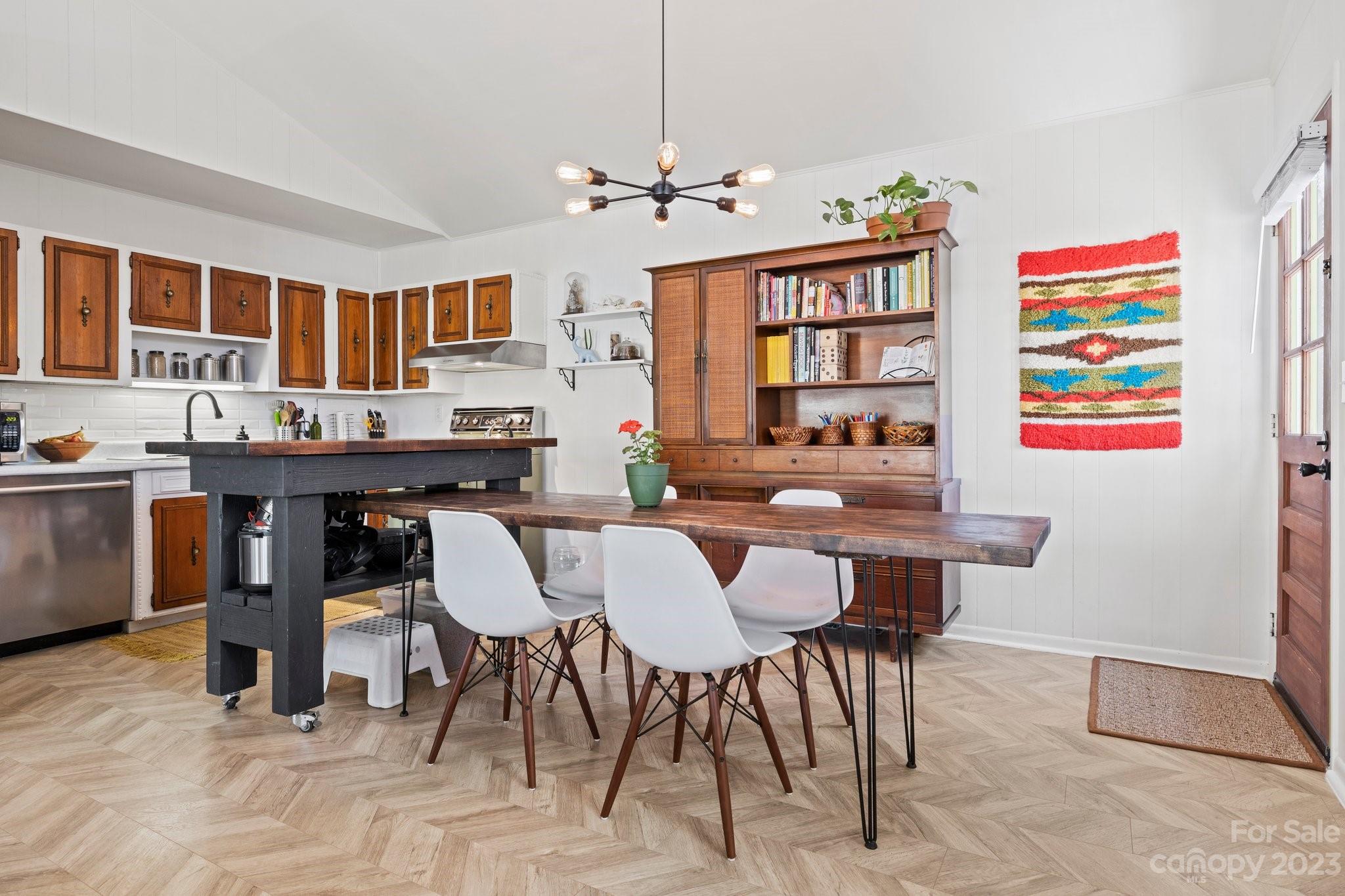 316 Rules Run Road Clyde, NC 28721 - Photo 14 of 47 a view of a dining room with furniture