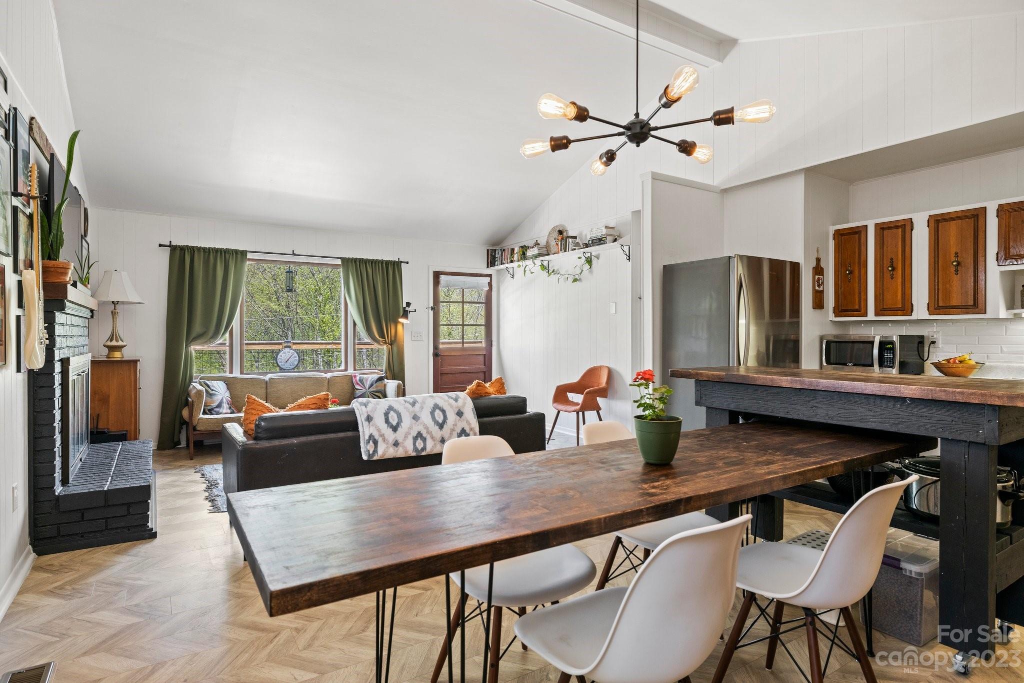 316 Rules Run Road Clyde, NC 28721 - Photo 15 of 47 a view of a dining room with furniture window and outside view