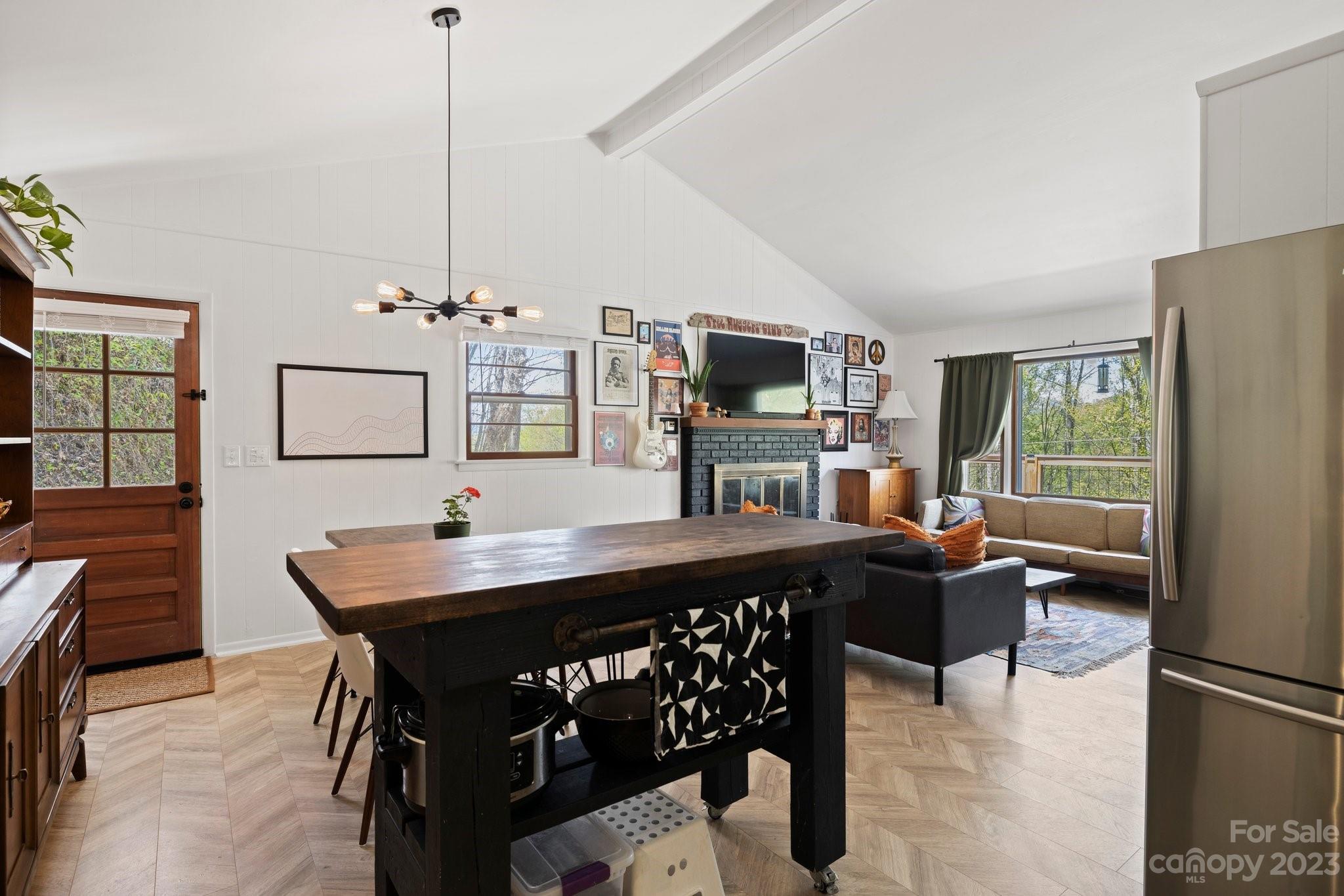 316 Rules Run Road Clyde, NC 28721 - Photo 16 of 47 a view of a dining room with furniture
