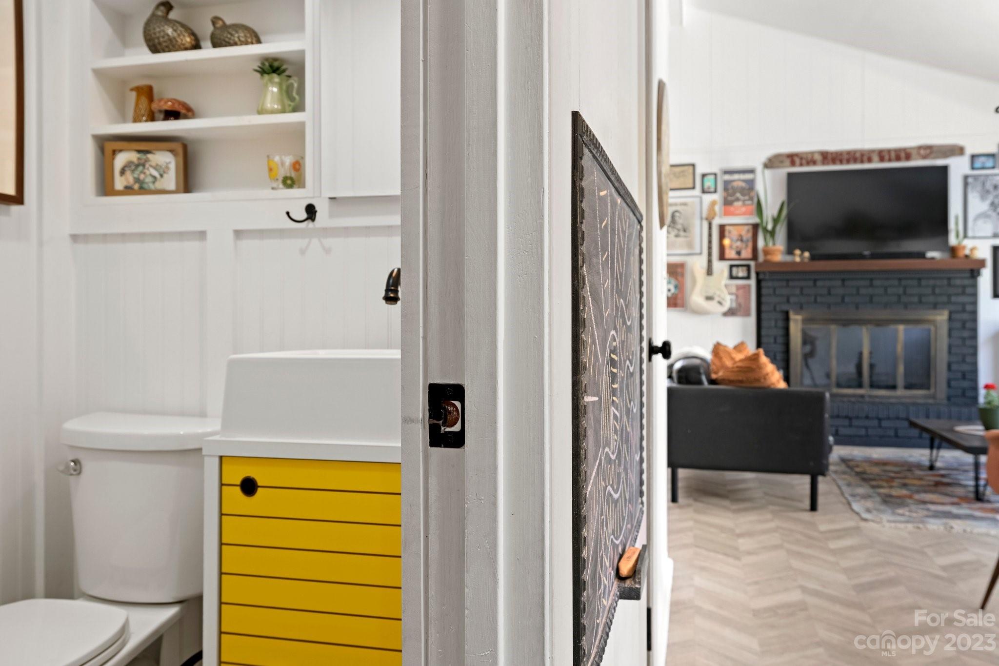 316 Rules Run Road Clyde, NC 28721 - Photo 21 of 47 a living room with furniture and a flat screen tv