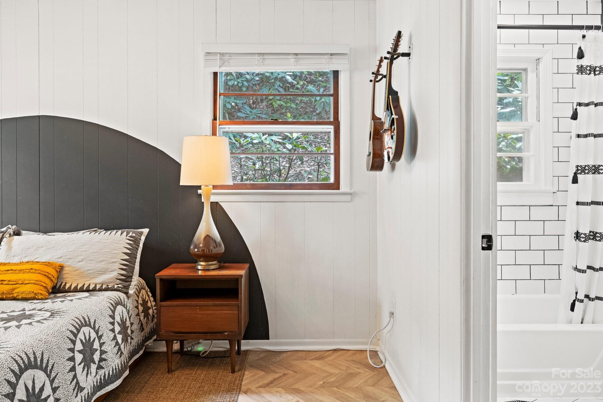 316 Rules Run Road Clyde, NC 28721 - Photo 25 of 47 a bedroom with a bed and a window