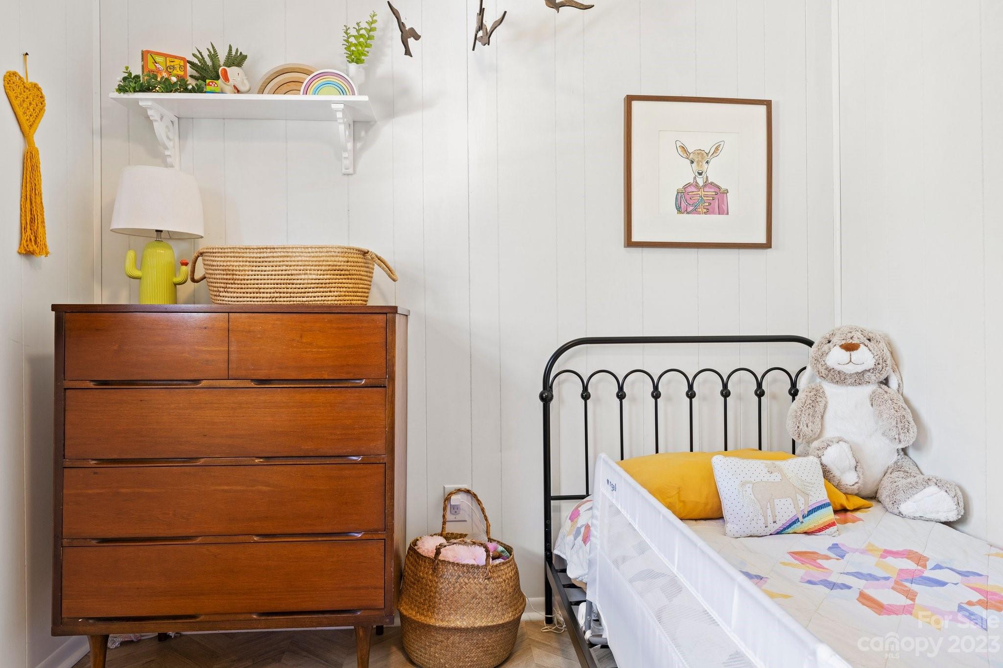 316 Rules Run Road Clyde, NC 28721 - Photo 29 of 47 a bedroom with a bed and wooden floor