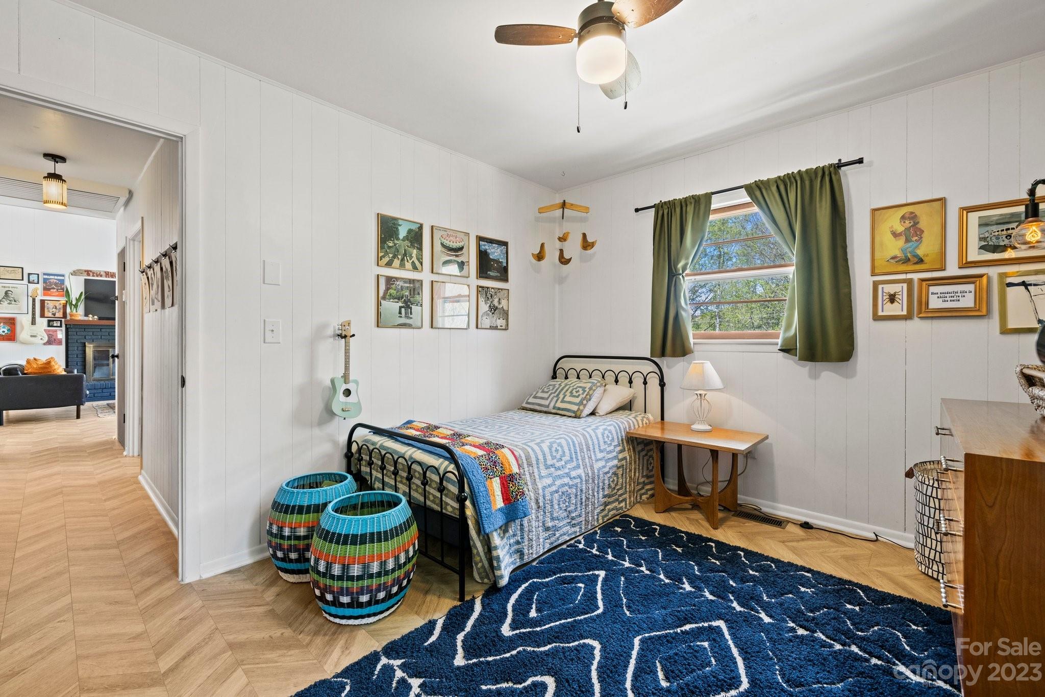 316 Rules Run Road Clyde, NC 28721 - Photo 32 of 47 a living room with furniture and painting on the wall