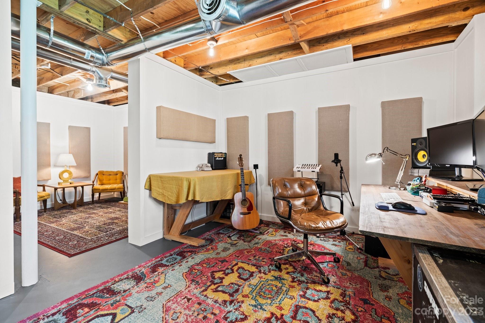 316 Rules Run Road Clyde, NC 28721 - Photo 35 of 47 a bedroom with furniture and a rug