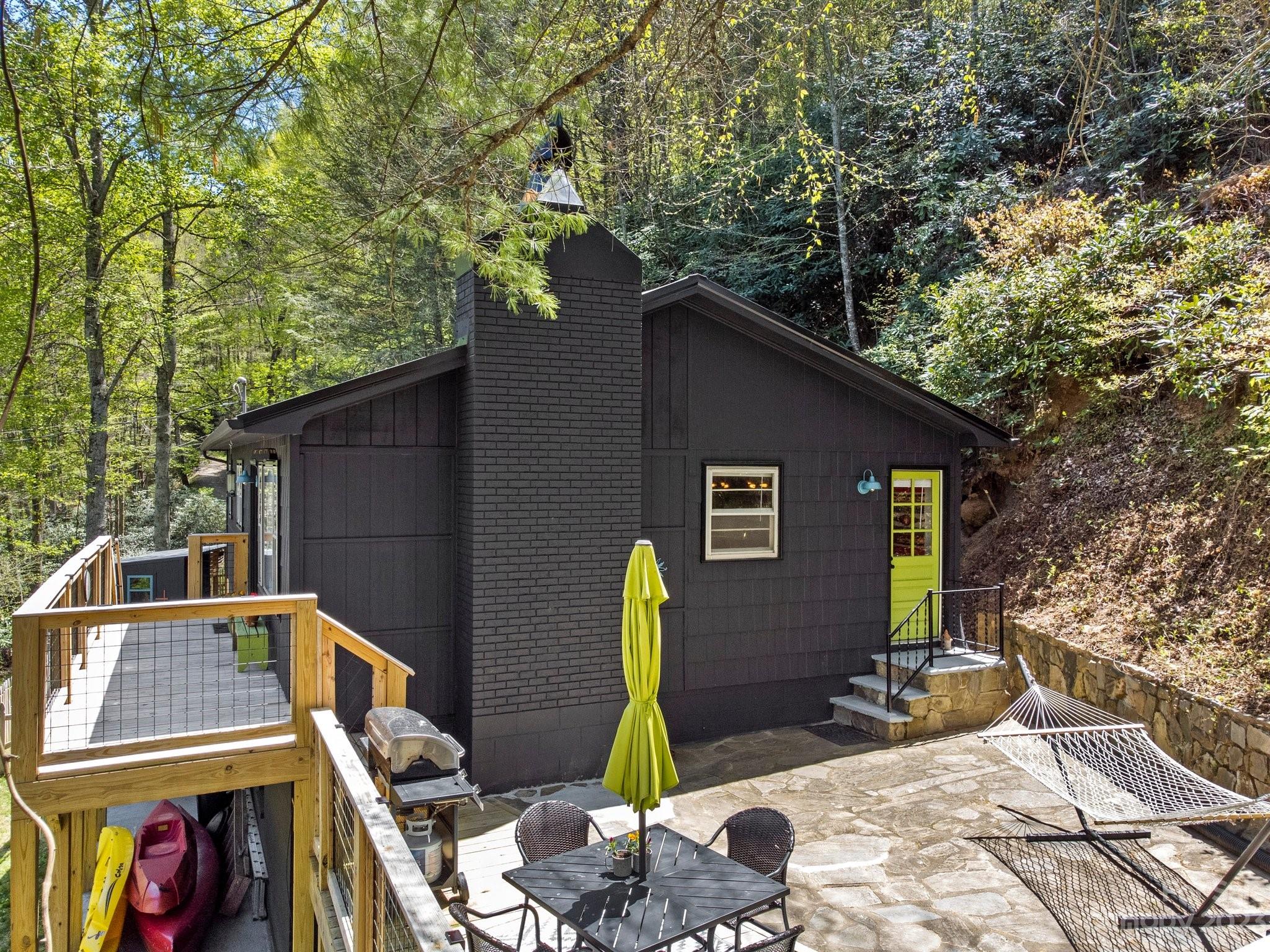 316 Rules Run Road Clyde, NC 28721 - Photo 39 of 47 a backyard of a house with seating space