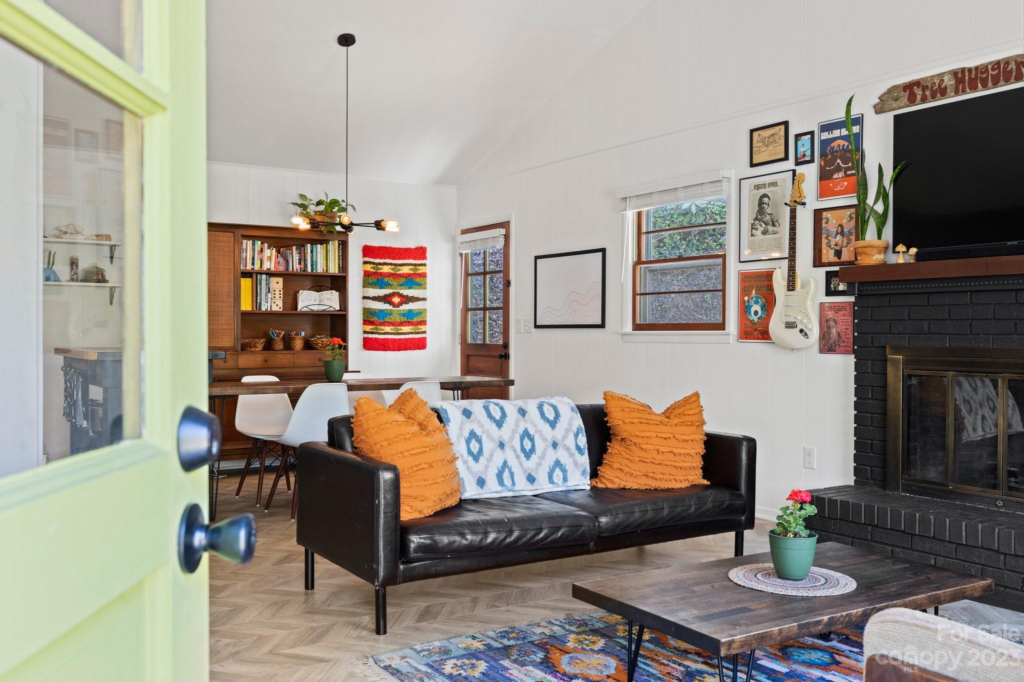 316 Rules Run Road Clyde, NC 28721 - Photo 7 of 47 a living room with fireplace furniture and a flat screen tv