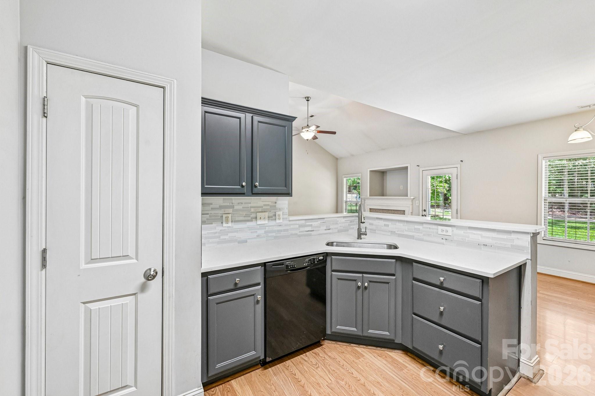 624 Hunley Street Monroe, NC 28112 - Photo 15 of 36 a kitchen with a sink and cabinets