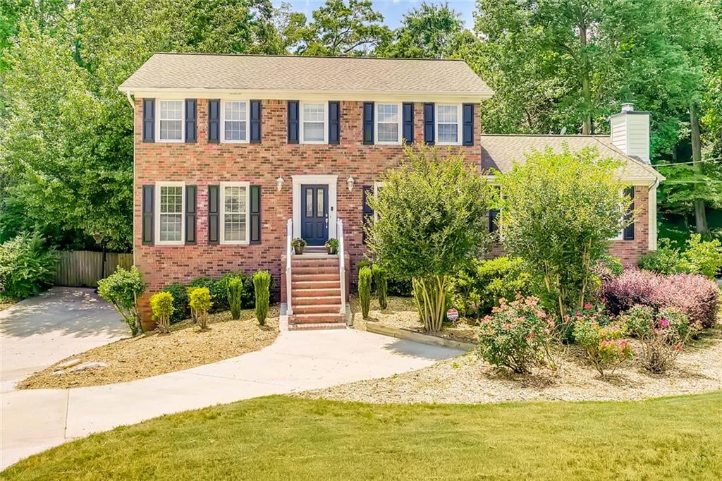 4988 Vermack Road Dunwoody, GA 30338 - Photo 1 of 1 Stately brick traditional is beautifully situated on a .40 acre lot. This well-maintained home features beautiful lush landscaping and great curb-appeal!