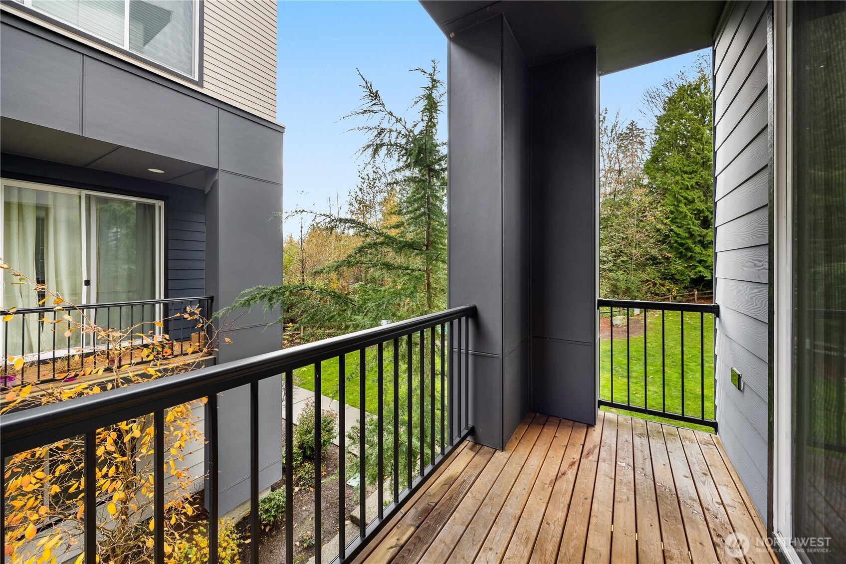 508 237th Street Southeast, Unit E Bothell, WA 98021 - Photo 11 of 35 a view of balcony with wooden floor