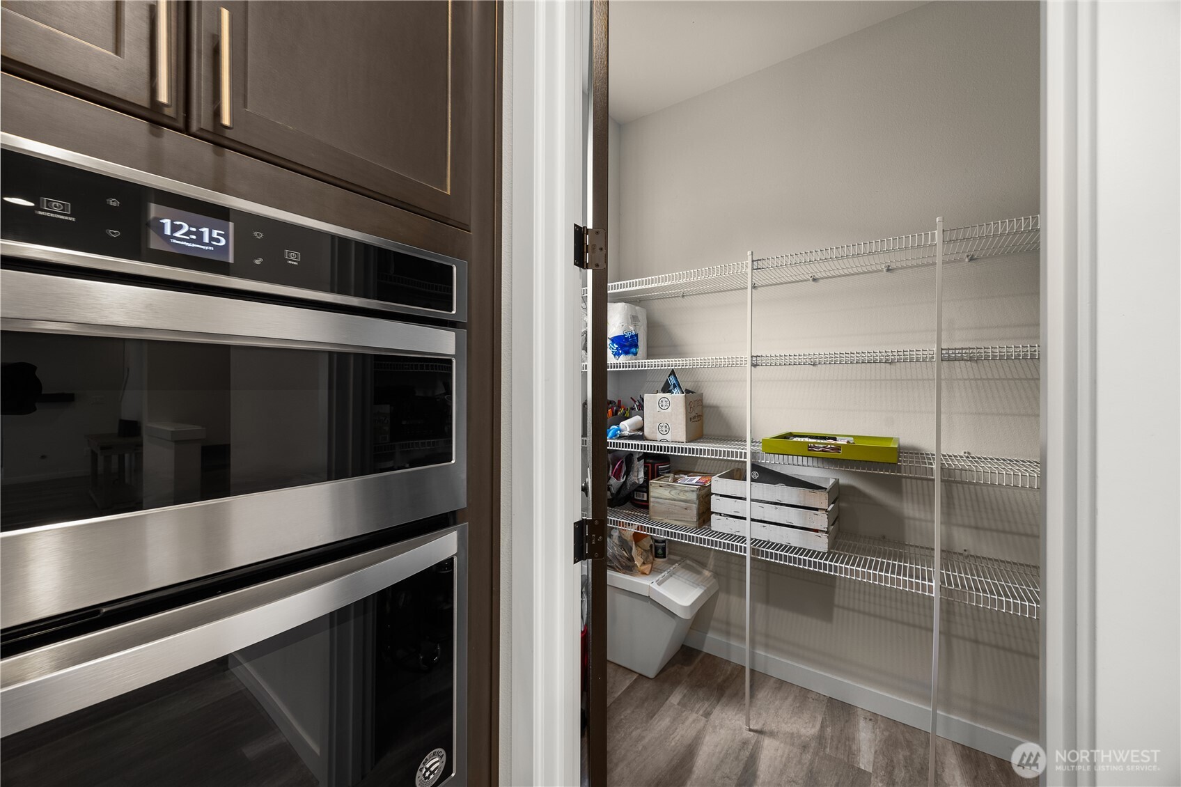 508 237th Street Southeast, Unit E Bothell, WA 98021 - Photo 16 of 35 a kitchen with a stove and a refrigerator