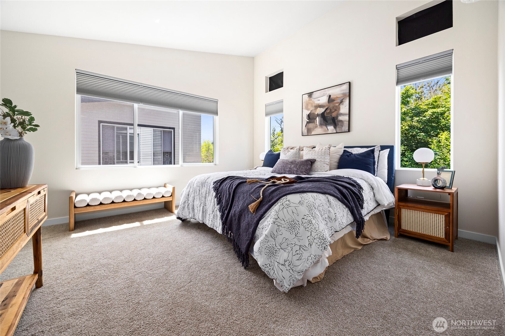 508 237th Street Southeast, Unit E Bothell, WA 98021 - Photo 21 of 35 a bedroom with a bed and a couch