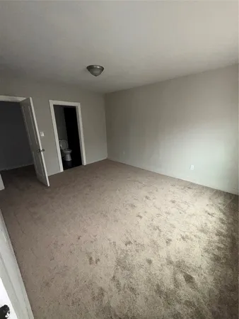 an empty room with a workbench