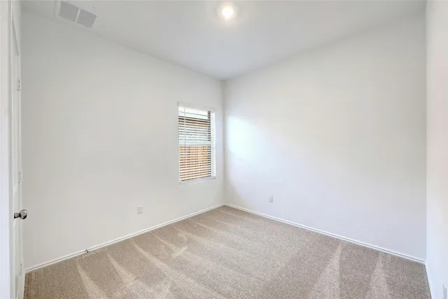 a view of a room with a window