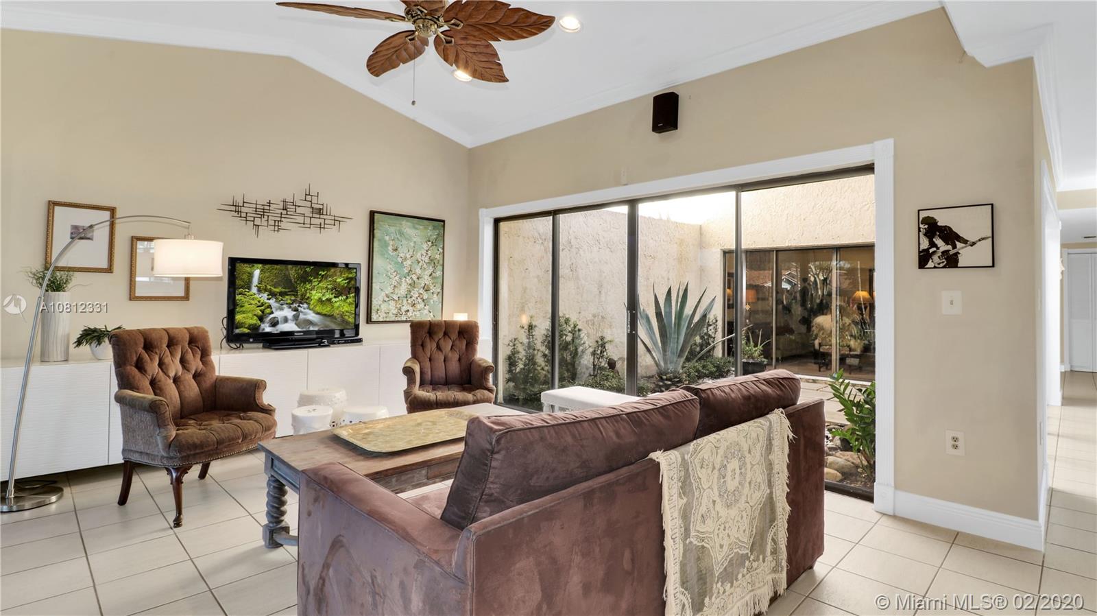 11339 Southwest 74th Terrace Miami, FL 33173 - Photo 16 of 31 FAMILY ROOM WITH FULL VIEW OF ATRIUM