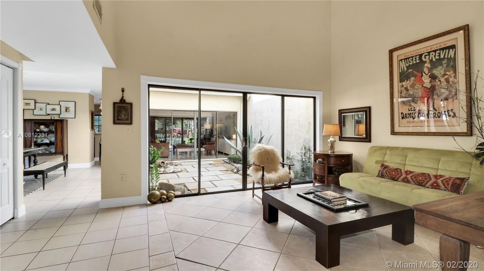 11339 Southwest 74th Terrace Miami, FL 33173 - Photo 7 of 31 LIVING ROOM WITH FULL VIEW OF ATRIUM
