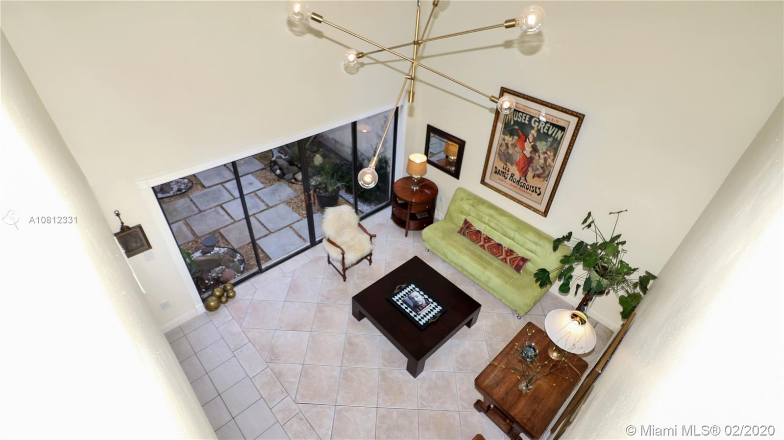 11339 Southwest 74th Terrace Miami, FL 33173 - Photo 9 of 31 LIVING ROOM VIEW FROM SECOND FLOOR