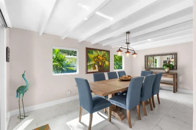 a kitchen with granite countertop a sink and a window