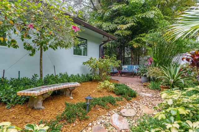 a view of a glass vase with flowers