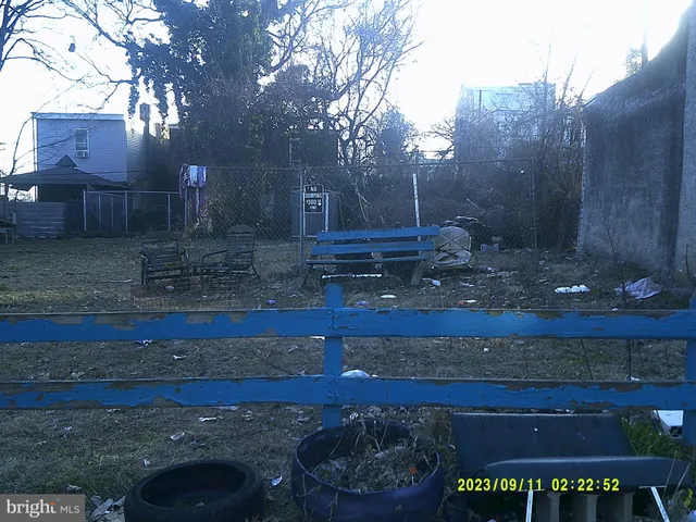 a view of a yard with an outdoor space