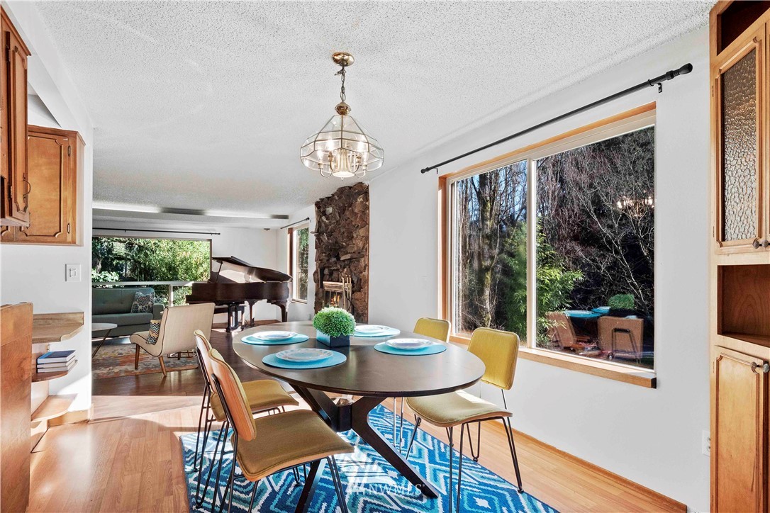 23718 23rd Avenue West Bothell, WA 98021 - Photo 12 of 36 a view of a dining room with furniture window and outside view