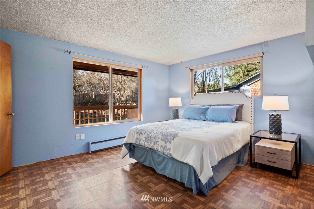 23718 23rd Avenue West Bothell, WA 98021 - Photo 14 of 36 a bedroom with a bed and a window