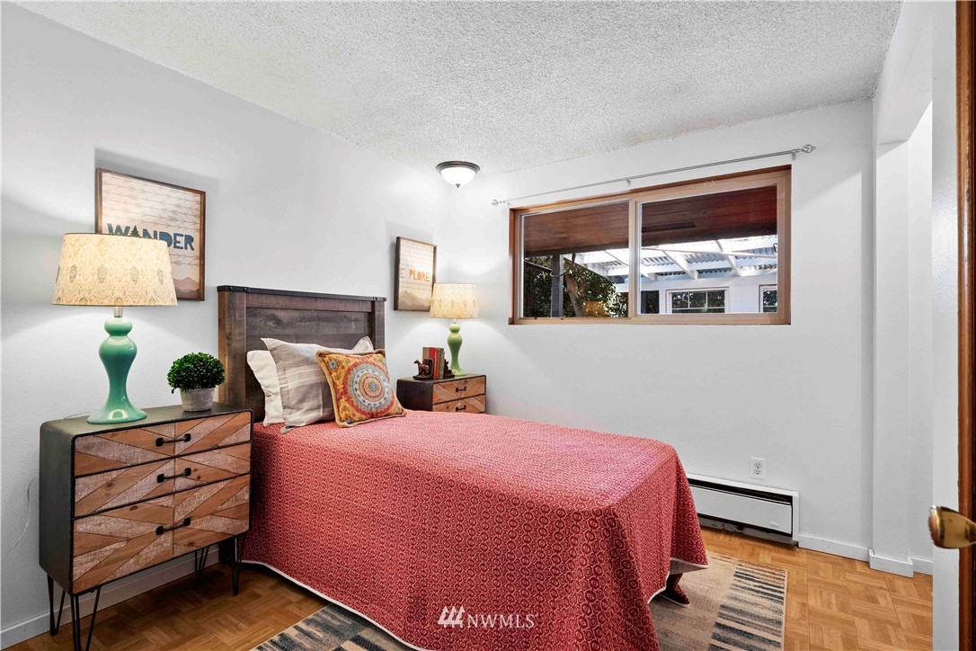 23718 23rd Avenue West Bothell, WA 98021 - Photo 17 of 36 a bed room with bed and a window