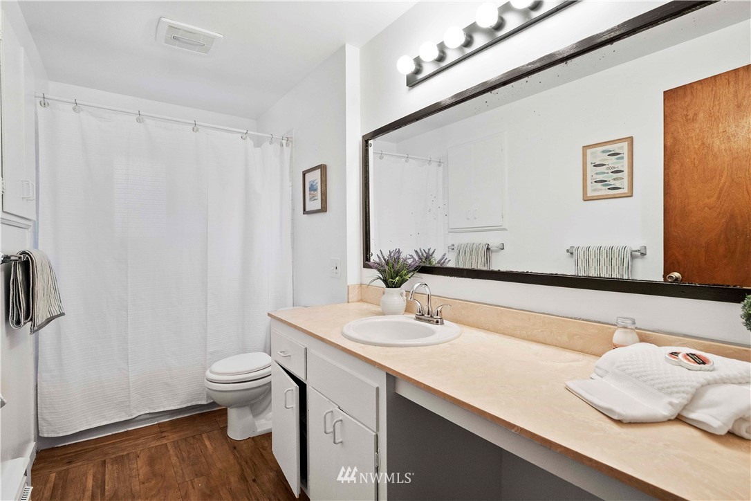 23718 23rd Avenue West Bothell, WA 98021 - Photo 19 of 36 a bathroom with a sink and a mirror