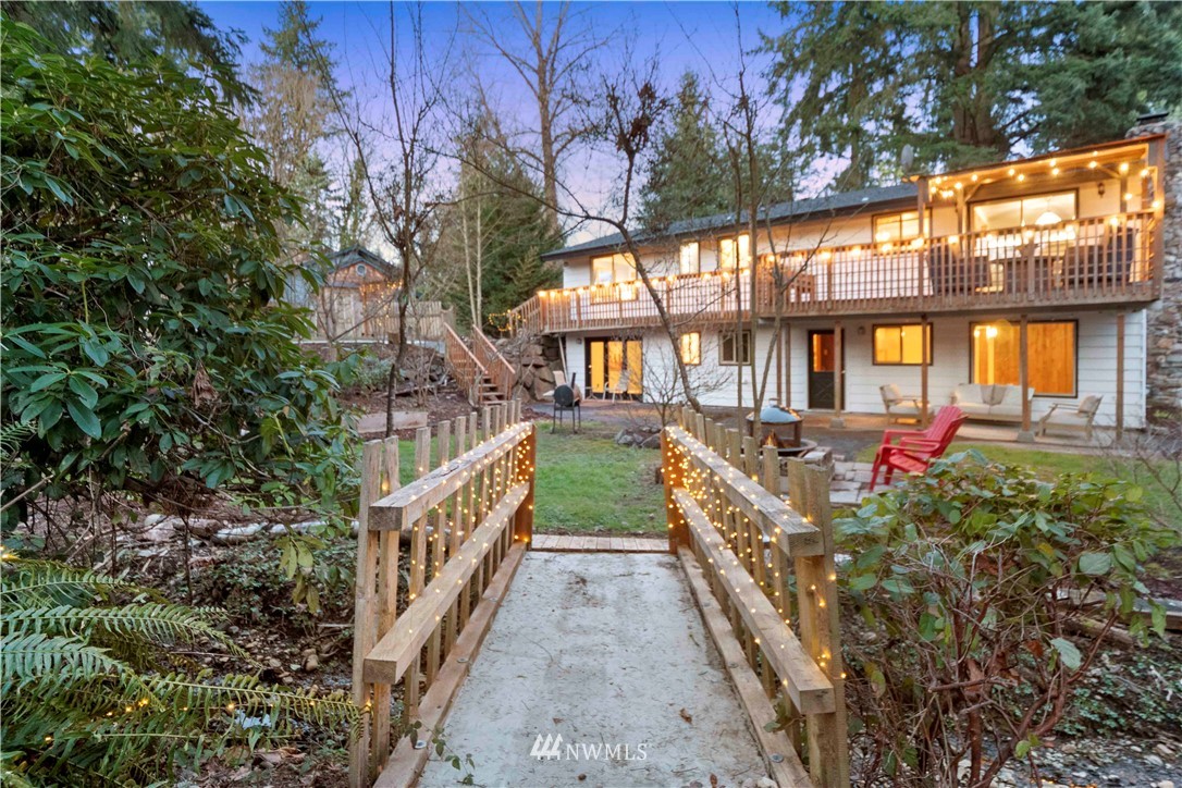 23718 23rd Avenue West Bothell, WA 98021 - Photo 33 of 36 a view of a house with large trees and stairs