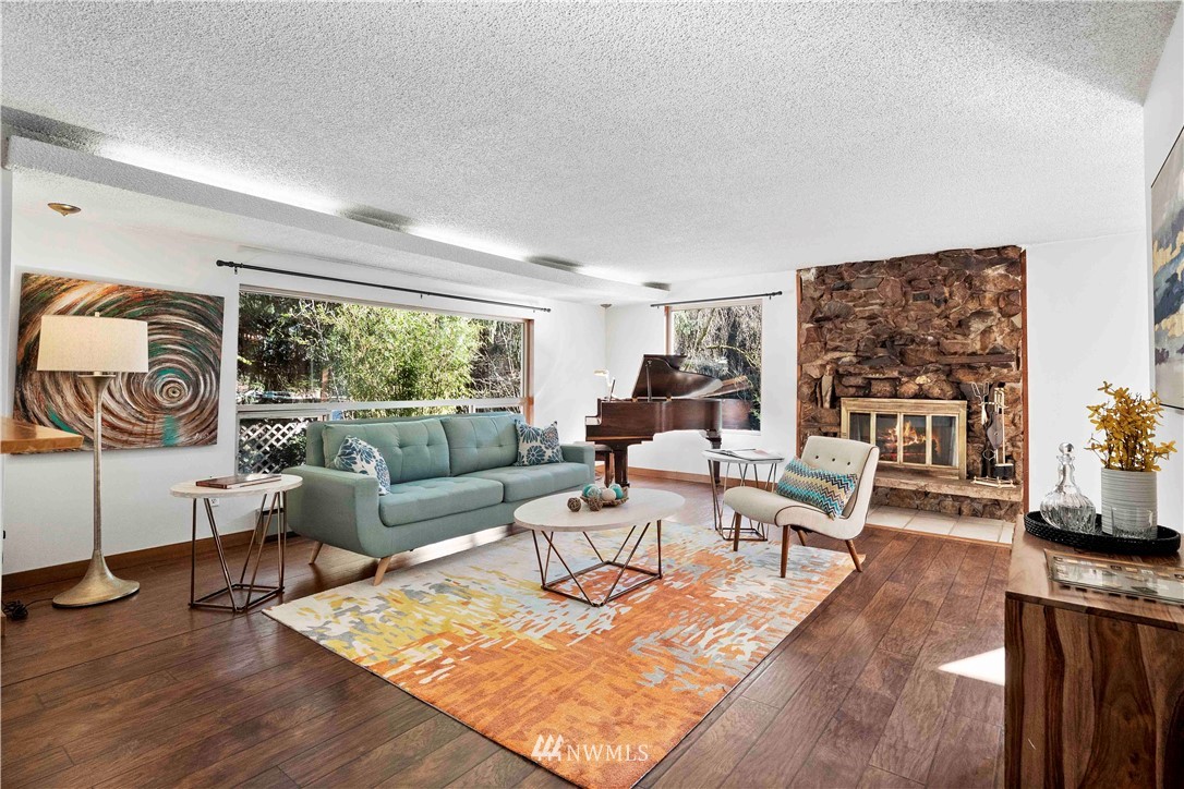 23718 23rd Avenue West Bothell, WA 98021 - Photo 6 of 36 a living room with furniture and a large window