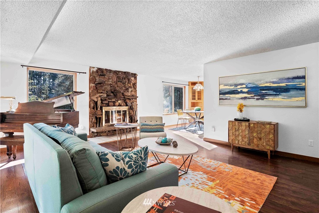 23718 23rd Avenue West Bothell, WA 98021 - Photo 7 of 36 a living room with furniture and wooden floor