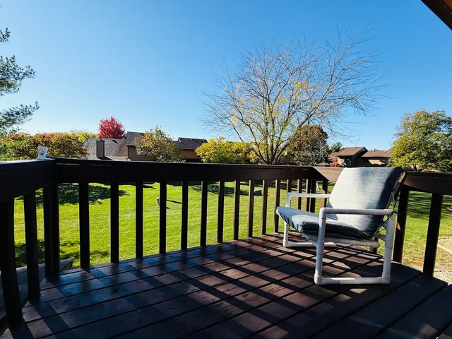 a view of a chairs and table on the wooden floor