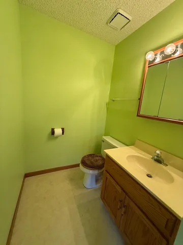 a bathroom with a sink and a toilet