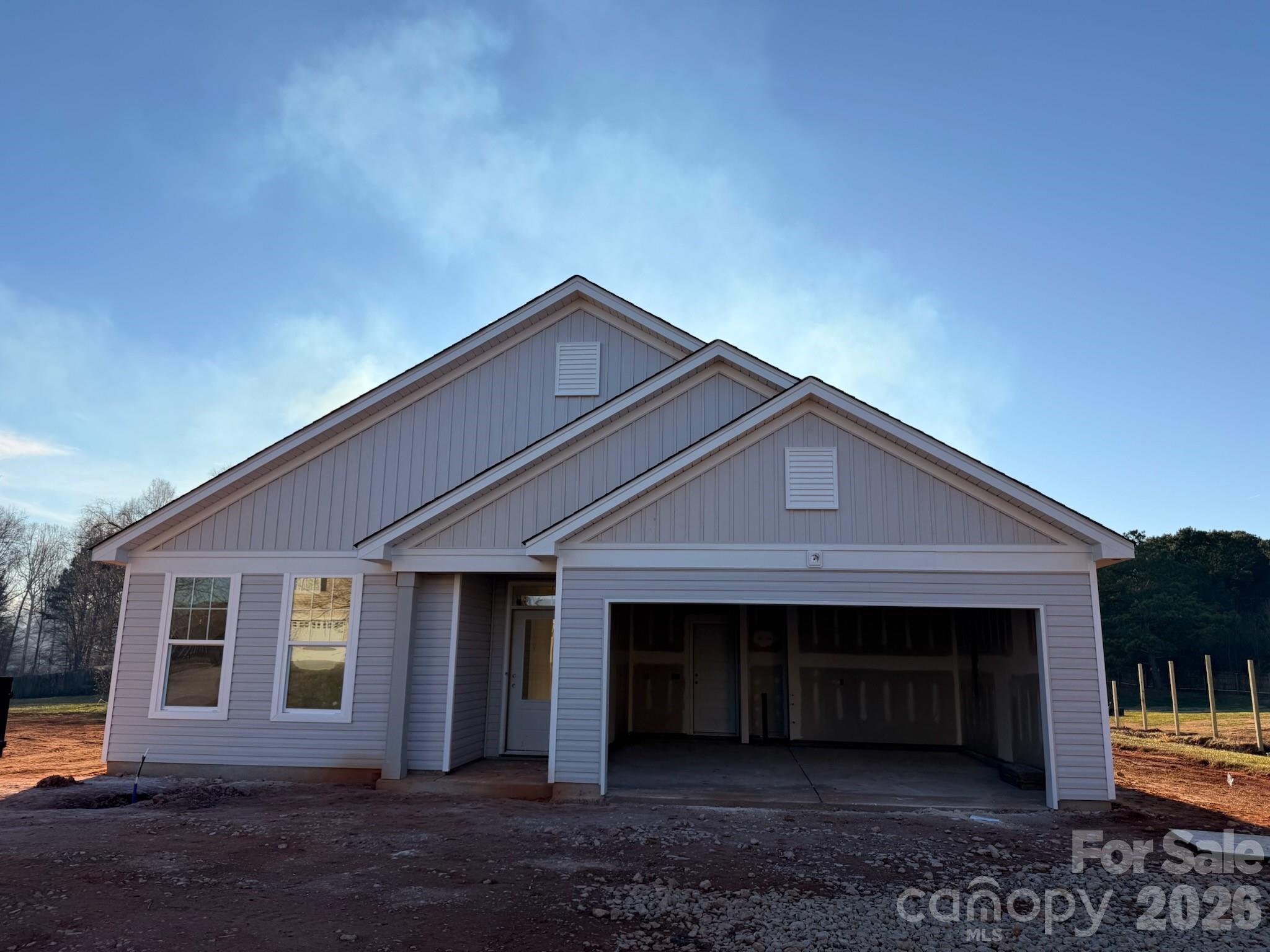 144 Longlea Drive Clover, SC 29710 - Photo 2 of 27 a front view of a house with a yard