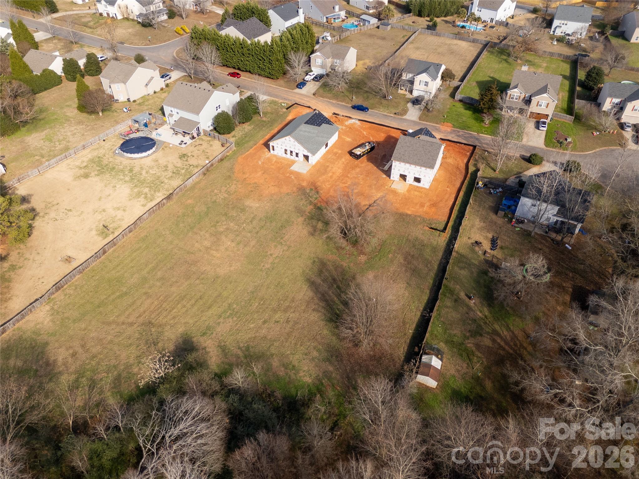144 Longlea Drive Clover, SC 29710 - Photo 5 of 27 an aerial view of residential houses with outdoor space