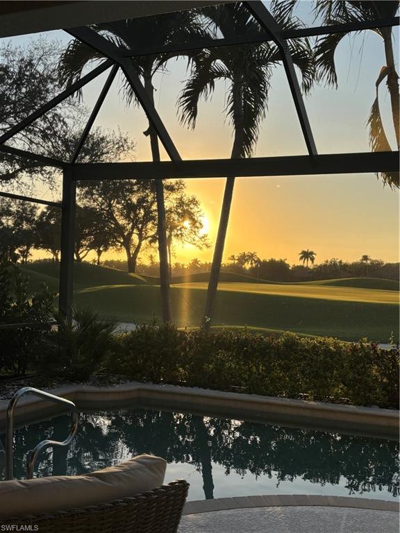 4304 Kensington High Street Naples, FL 34105 - Photo 33 of 40 a view of swimming pool from a balcony