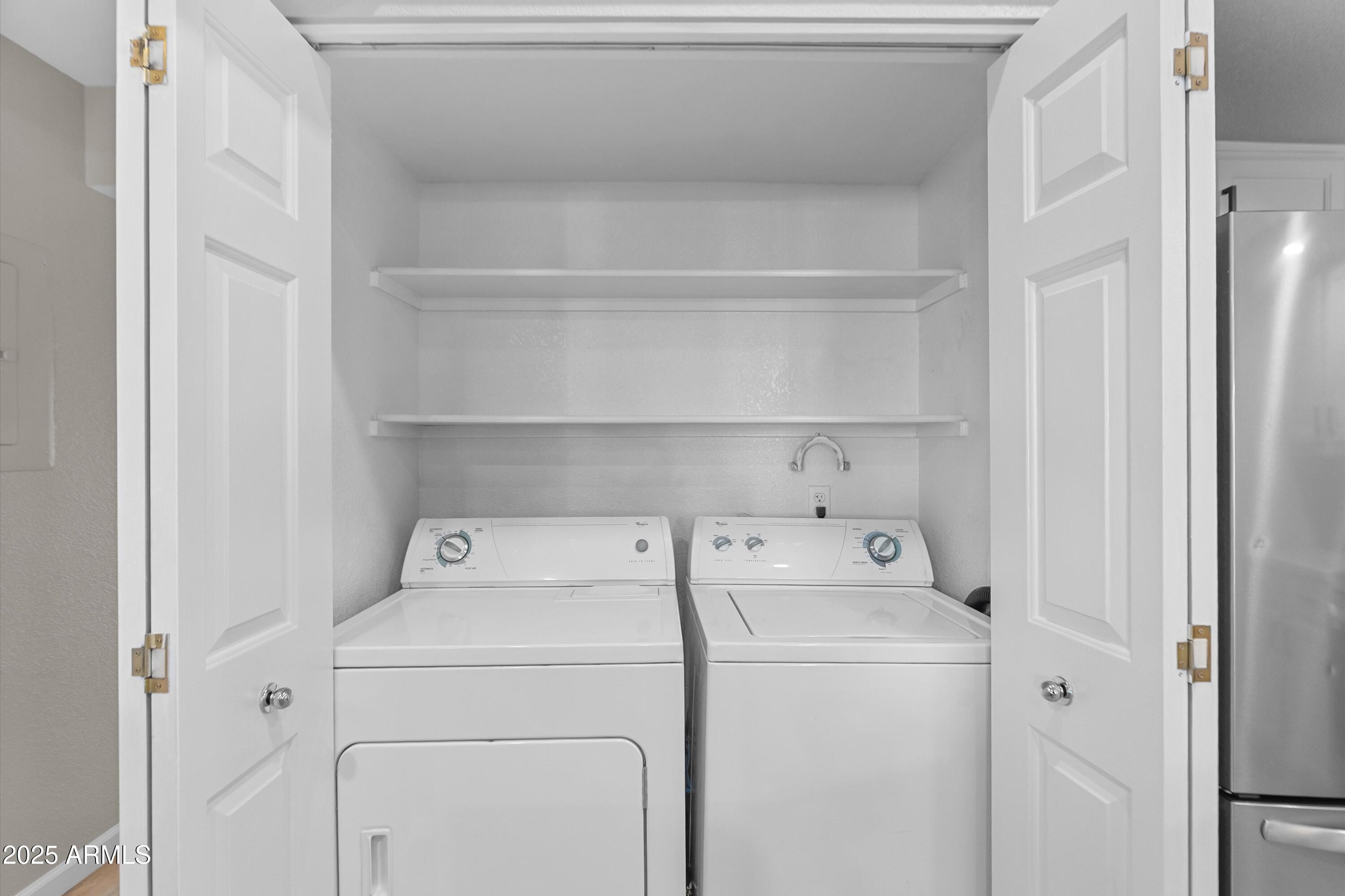1331 West Baseline Road, Unit 338 Mesa, AZ 85202 - Photo 16 of 28 a utility room with dryer and washer