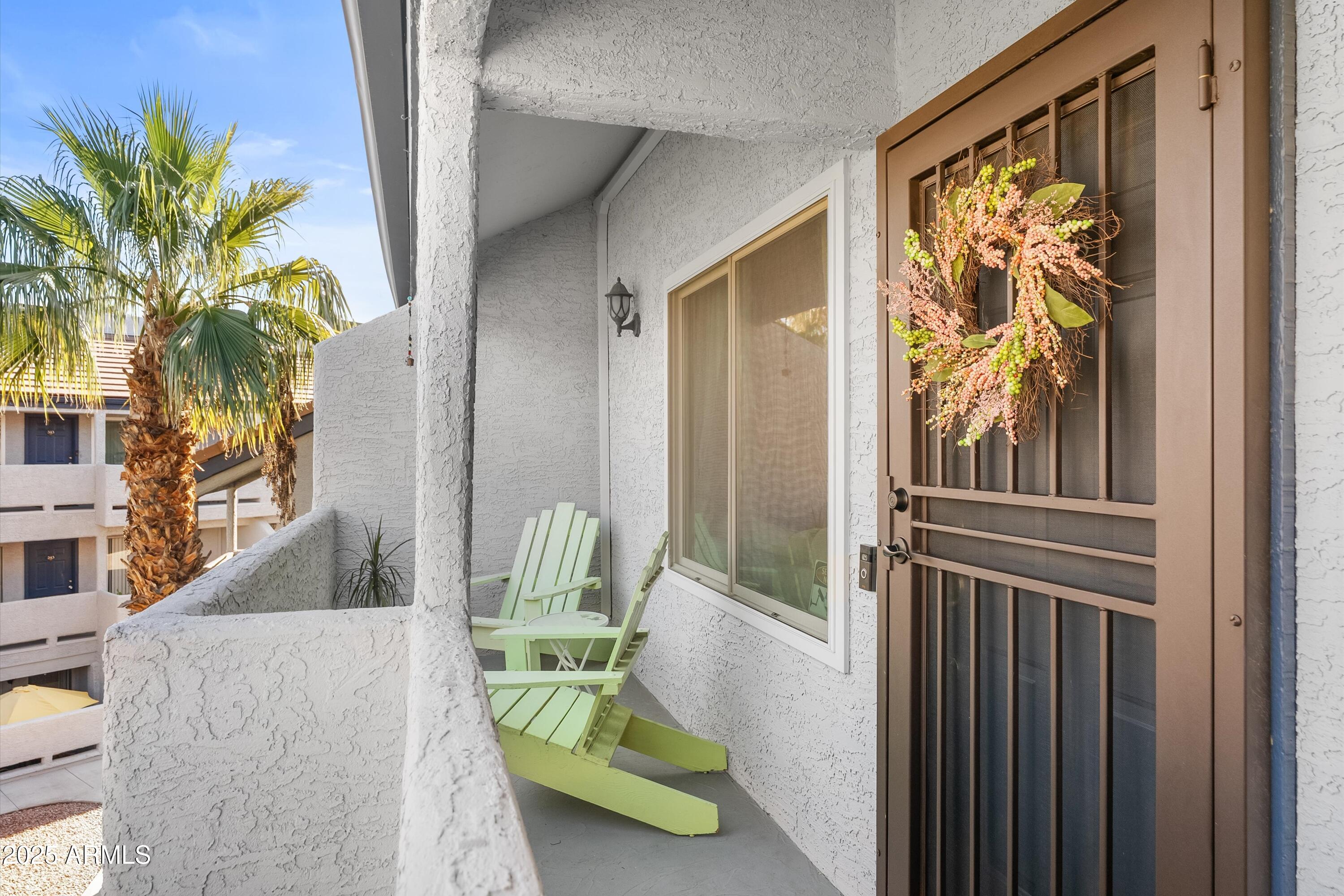 1331 West Baseline Road, Unit 338 Mesa, AZ 85202 - Photo 2 of 28 a view of balcony with furniture