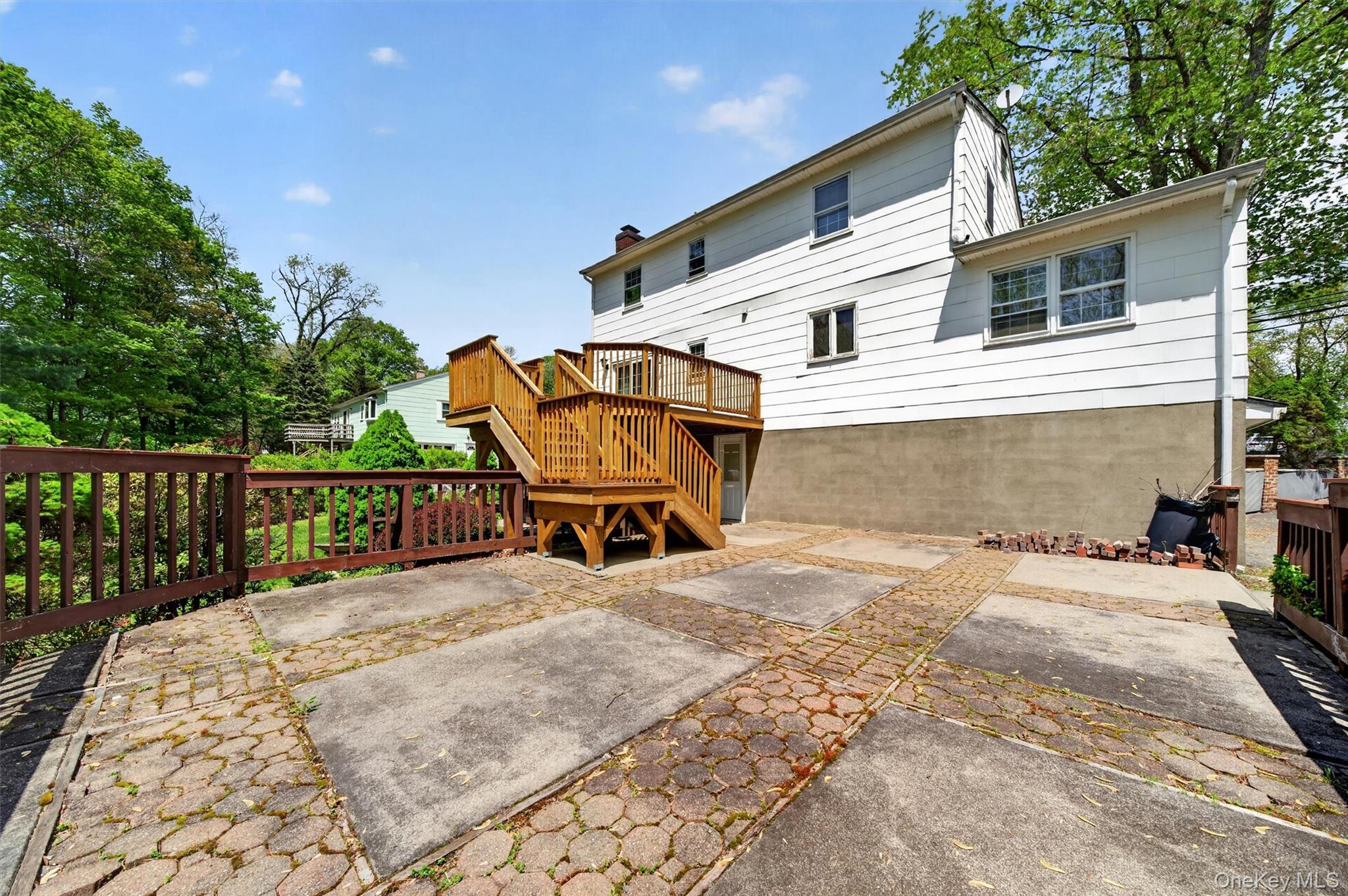 155 Pine Tree Road Monroe, NY 10950 - Photo 43 of 49 a view of a wooden deck and a backyard