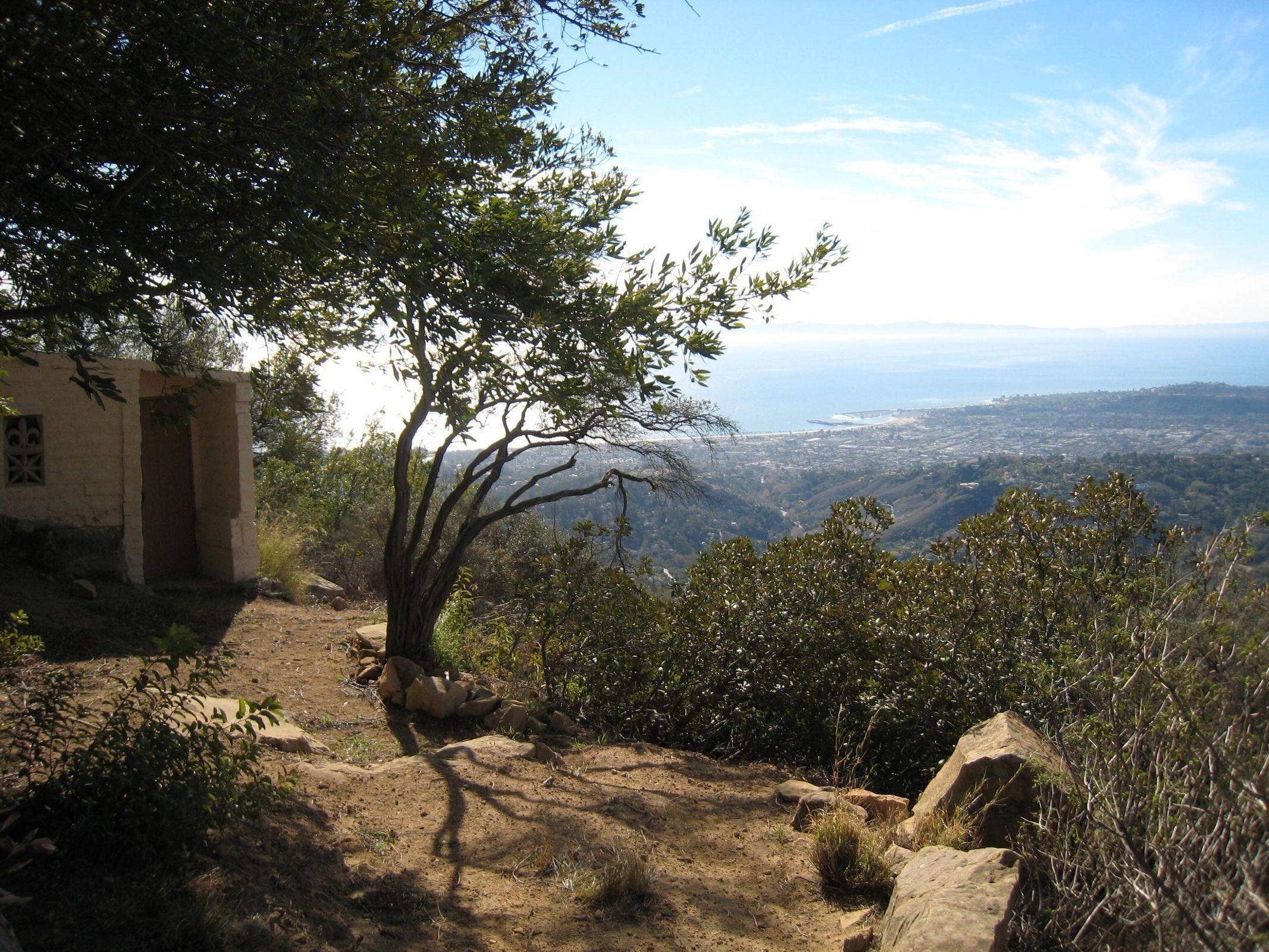 a view of a backyard of the house