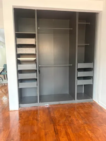 a view of a room with rack on the wall