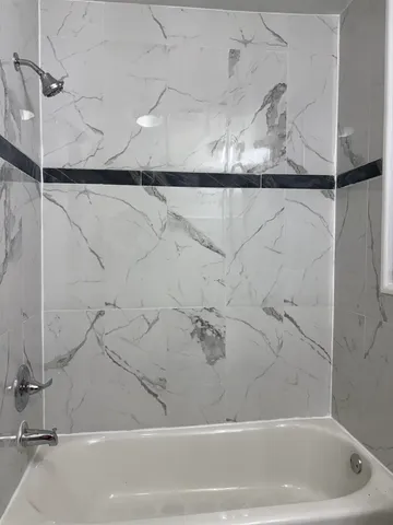 a bathroom with a bathtub