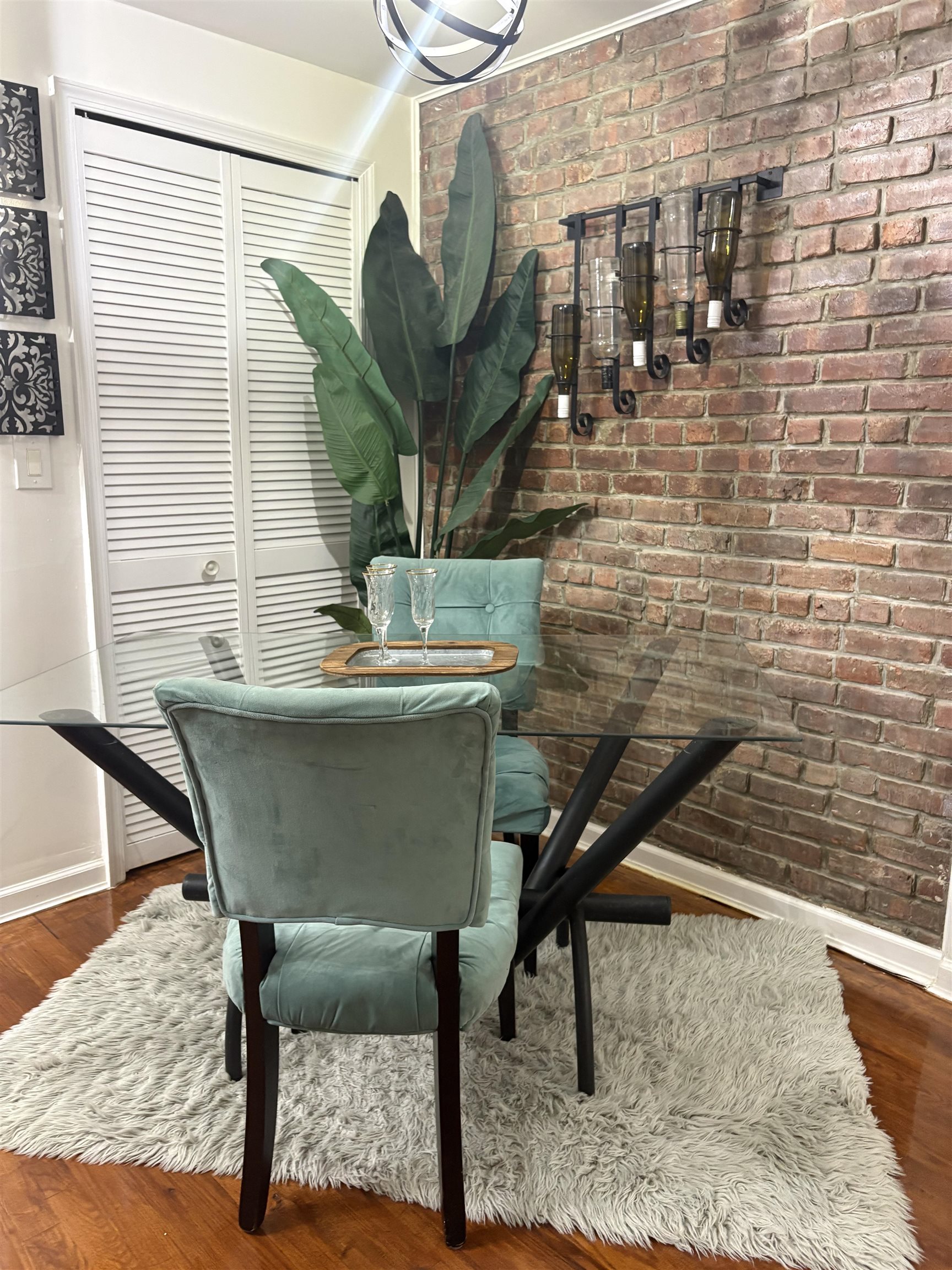 77 Crescent Avenue, Unit 5 Jersey City, NJ 07304 - Photo 5 of 18 a dining room with furniture and wooden floor