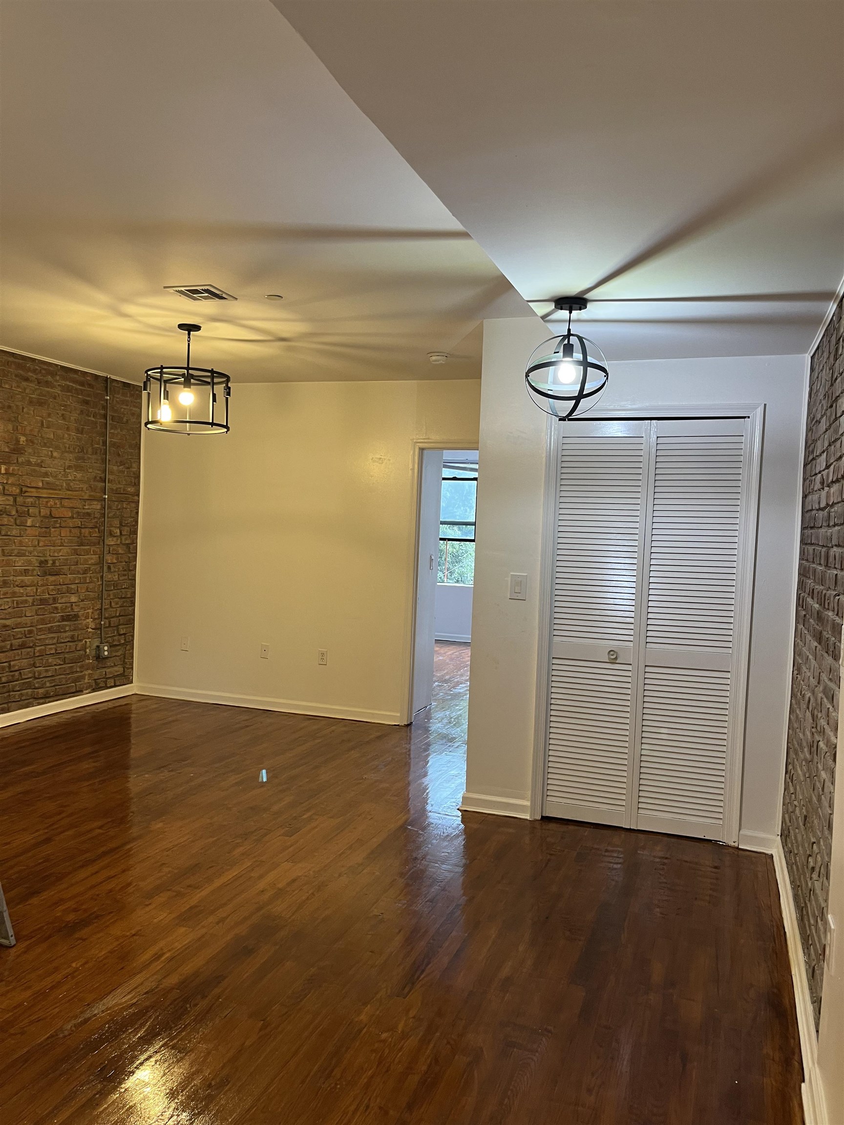 77 Crescent Avenue, Unit 5 Jersey City, NJ 07304 - Photo 10 of 18 wooden floor in an empty room