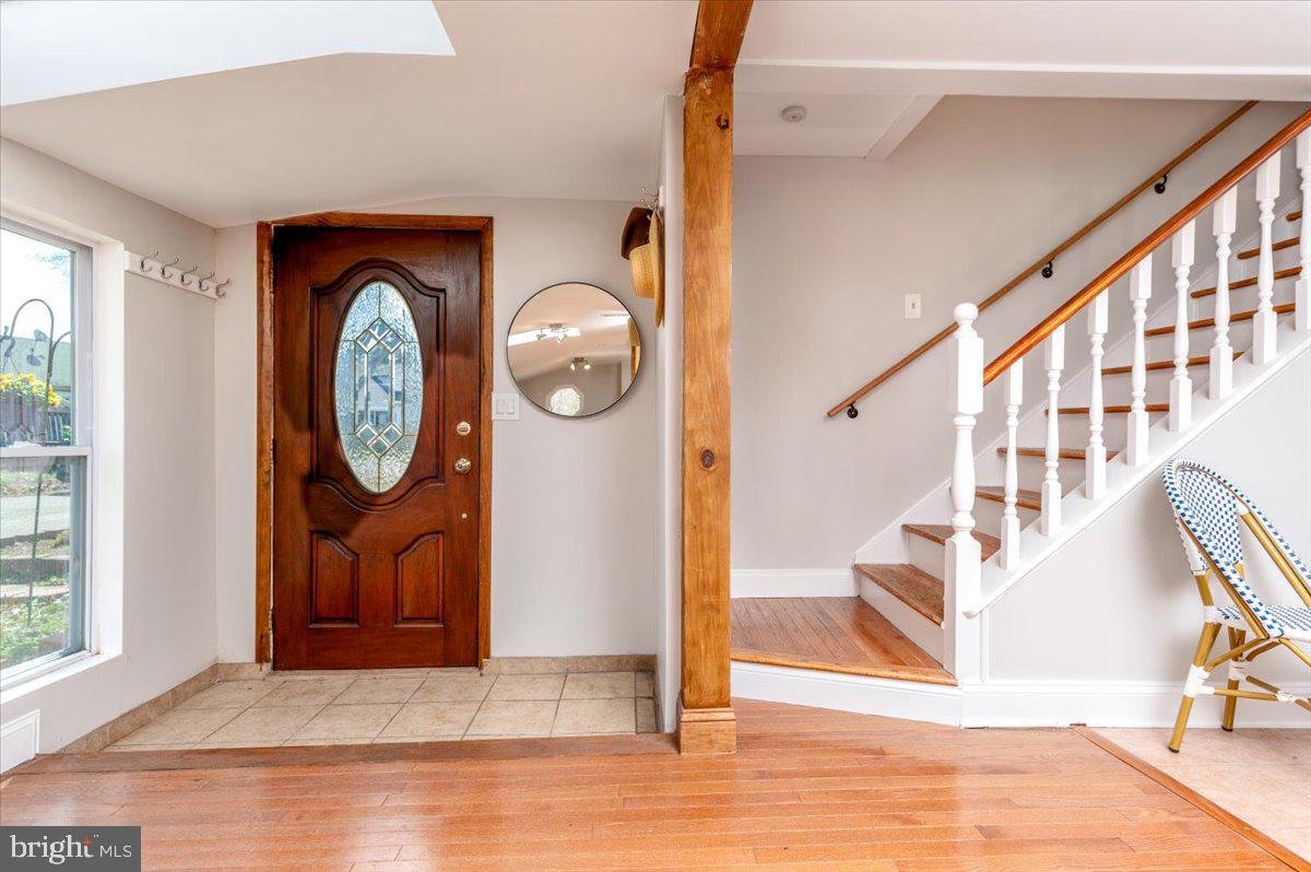 626 Clark Avenue Deale, MD 20751 - Photo 19 of 74 a view of a hallway with wooden floor and entryway