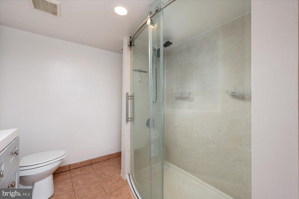 626 Clark Avenue Deale, MD 20751 - Photo 23 of 74 a bathroom with a toilet and shower