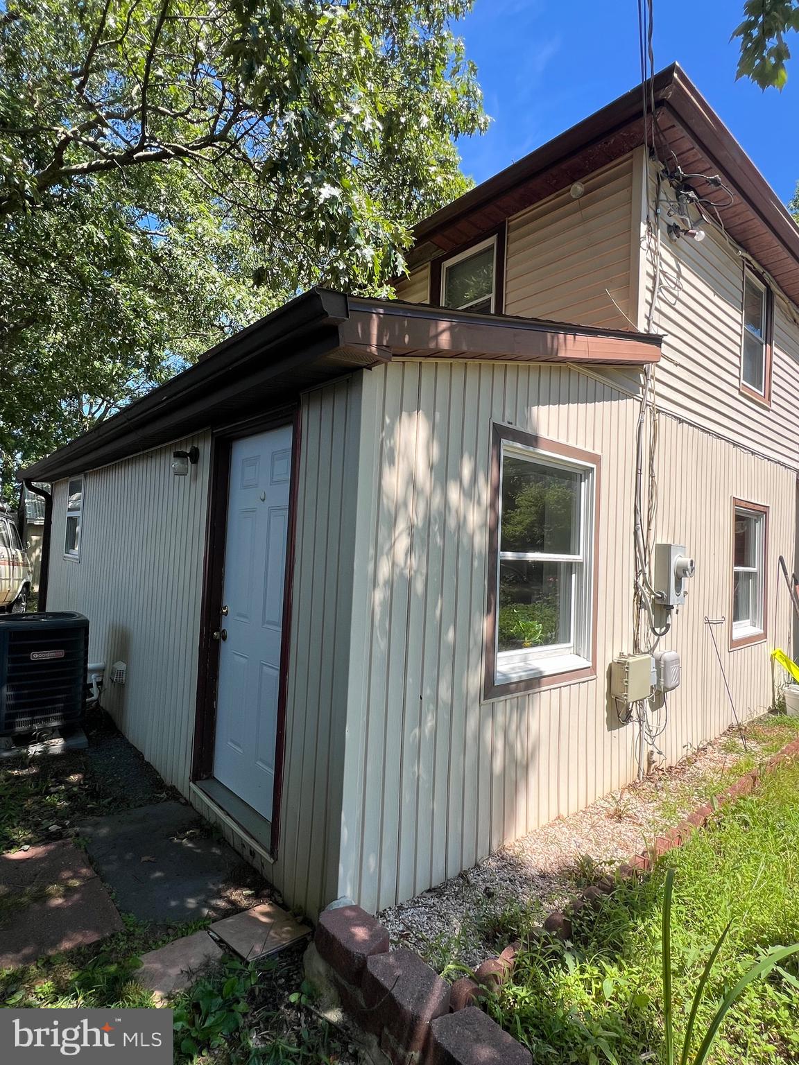 626 Clark Avenue Deale, MD 20751 - Photo 32 of 74 a front view of a house with garden