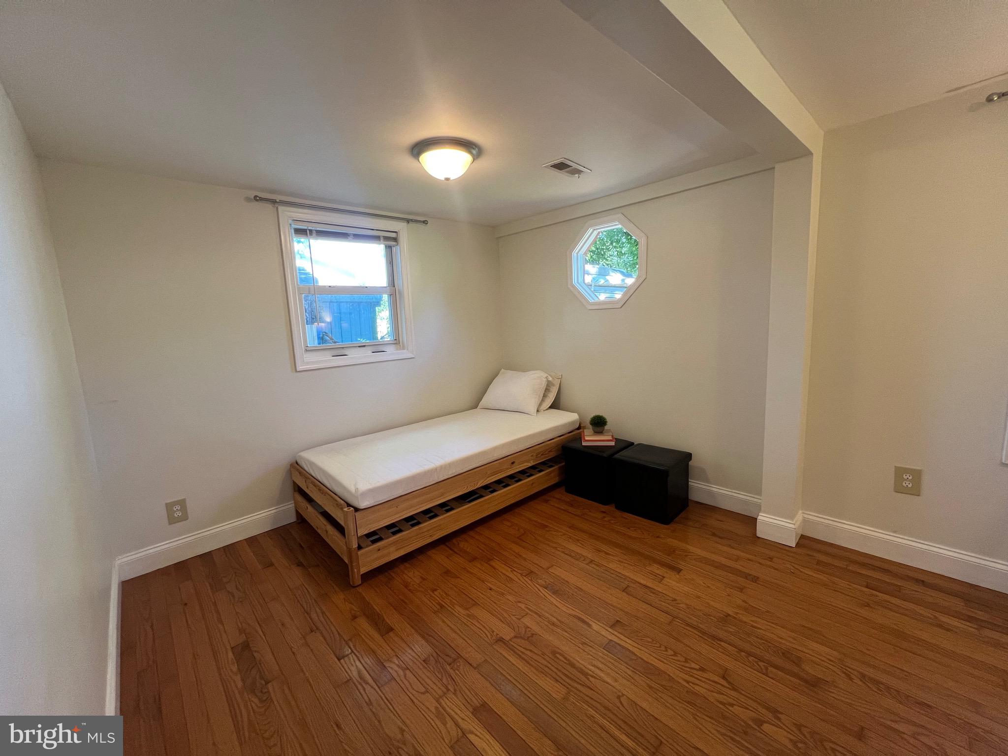 626 Clark Avenue Deale, MD 20751 - Photo 36 of 74 a room with a bed and a window