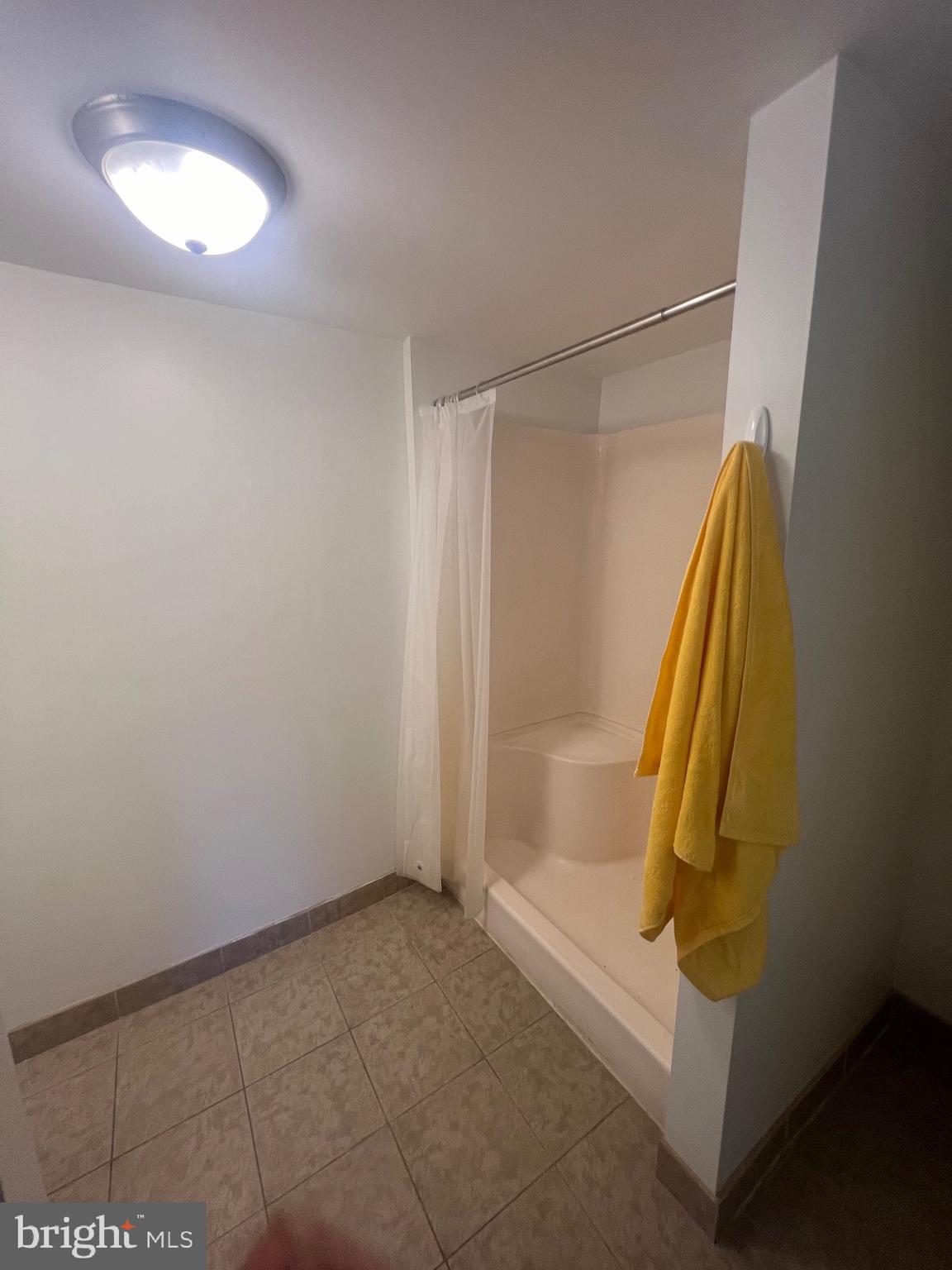 626 Clark Avenue Deale, MD 20751 - Photo 40 of 74 a bathroom with a tub and shower